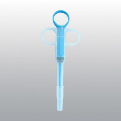 Таблеткодаватель (Wogy) 15х5.5см с 2-мя насадками для жидких лекарств и для таблеток, для животных